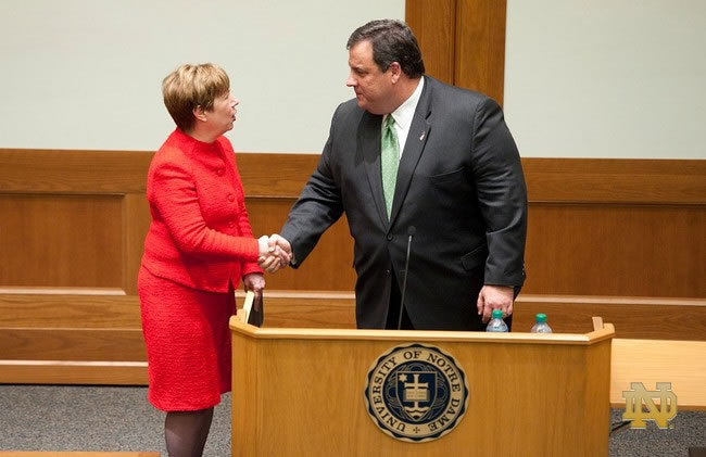 Dean Nell Jessup Newton shakes hands with New Jersey Gov